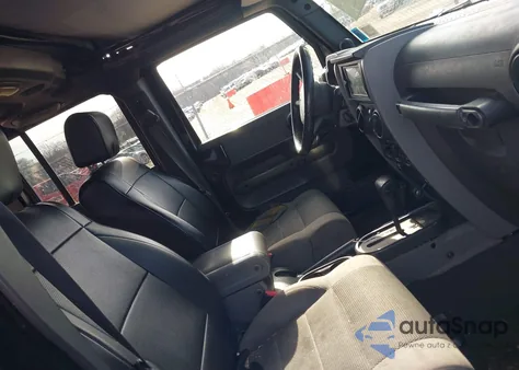 2007 Jeep Wrangler Unlimited Sahara z USA, uszkodzony, nr VIN 1J8GA59147L214088